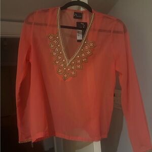 Elegant Coral Blouse with Gold Detailing